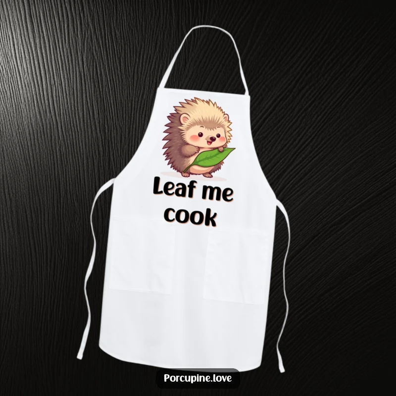Funny fluffy porcupine apron, attempting to balance a single leaf on its quills, making kitchen tasks hilariously delightful.