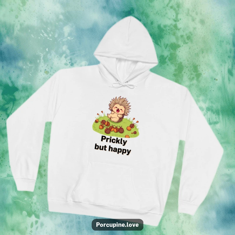 Funny Hoodie: A cute porcupine character joyfully rolls down a grassy hill with acorns, looking utterly delighted.