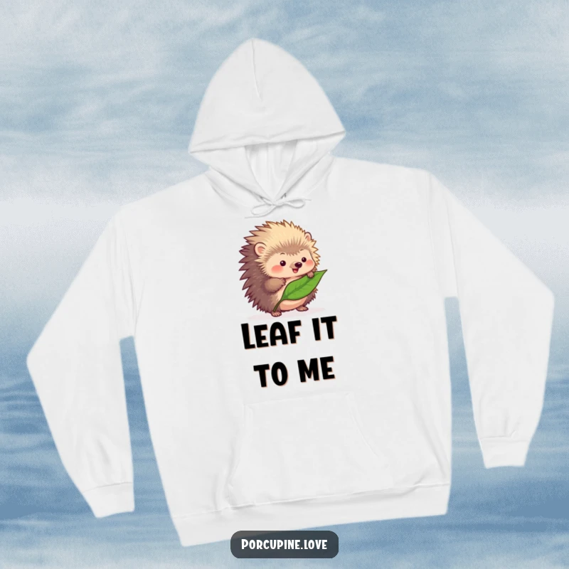 Funny fluffy porcupine hoodie, concentrating hard to balance a single leaf on its quills, inspiring cozy smiles.